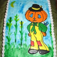 Pumpkin Man Cake from class where we learned how to do colorflow. Then we got to paint whatever we wanted behind our chosen figure. First time painting...