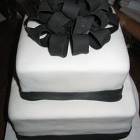 Work Wedding Shower Host desperately wanted this "simple" cake. Hadn't been doing cakes very long and this was my first major fondant cake, and...