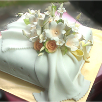 Wedding Gift Cake. Butter cake with white fondant and sugarpaste flowers.