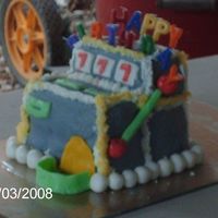 Slot Machine MY BOYFRIENDS MOTHER LOVES THE CASINO AND SHE LOVES THE SLOTS! SHE GOT A REAL KICK OUT OF THIS ONE. THE CAKE IS YELLOW WITH ROLLED...