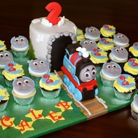 Thomas Thomas is styrofoam covered with fondant. Small cake covered with fondant.