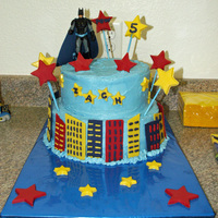 Batman Birthday Cake Batman themed 5th birthday cake for my son. 10" and 8" tiers, all decorations made from chocolate, Batman toy on top. Design idea...