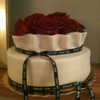 Cutting Ceremony Cake With Cupcakes The Bride wanted Cup Cakes but, this the Cake that I made for them to cut. It is an 8 inch cake 4 inches high layered with Mocha Ganache...