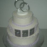 25Th Anniversary Cake WASC cake for the botton and top tiers, buttercream icing and filling, royal icing flowers