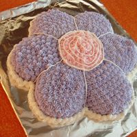 Purple Flower Purple Flower made with buttercream from the Wilton flower pan.