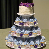 My First Wedding Cake Order Bride wanted cupcake tower, half are chocolate, half white. Cupcakes iced in WBH buttercream. Top cake iced in buttercream w/ coconut....