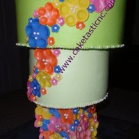 Flowery Upside Down Cake Buttercream with Fondant flowers.