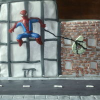 Spiderman Cake Spiderman cake for six year old. Spiderman is made of fondant.