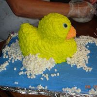 Dscn2245.jpg The cake was made from the Wilton 3-D cake pan and I used the Wilton large retangular pan for the tub...The suds are made with micro mini...