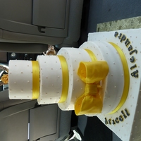 5 Tier 15Nera Yellow Cake For Twins wasc cake with whipped ganache filling. Buttercream throughout with edible peals, fondant bow and fondant names with luster dust. Largest...