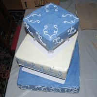 Blue Cake My friend was moving to Italy to pursue his modeling career and so he had a huge party before he left. This is what he asked for. White...