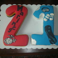 21St Bday Cake cake done for twin boys 21st bday one is a marine the other is in to snowboards. all fondant pieces.