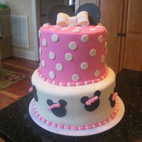Minnie Mouse Cake 2 tier Minnie Mouse themed cake. thanks to everyone on CC for inspiration. small was for little girl to dig in to.