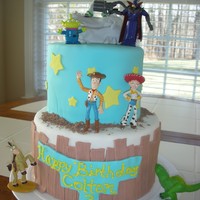 Toy Story 3 tier fondant accents and plastic figures