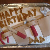 Dad's Toolbelt Cake Toolbelt was made with marshmallow fondant, first time using it and I LOVE it!! The tools were made with white chocolate and painted with...