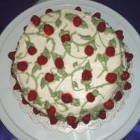 Cake With Raspbery Filling And Fresh Raspberries This is a red velvet cake with raspberry filling and fresh raspberries dipped in red crushed cake sprinkles on top. It has cream cheese...