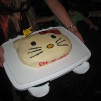 Hello Kitty yellow cake frosted in buttercream. 1st time using "Viva" paper towel method. And also "painting" on the the frosting....