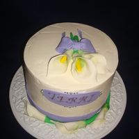 Calla Lily Cake For One Of My Friends chocolate marble cake swiss merengue icing and chocolate ganache with strawberries for filling.