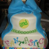 50Th Birthday Cake 12" &10" cake covered/decorated with fondant. I made a 3D "50" out of fondant/gumpaste that stuck in the top, right...