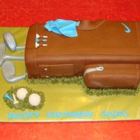 Golfbag Cake I did this cake for my dad. I didn't like the wilton golf bag pan so I used a 11x15 and carved it. Everything is fondant, except tfot...