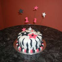 Zebra Print Bday Cake This was done for a family member that was turning 13! It was my first attempt at zebra stripes. I really had fun making this one!