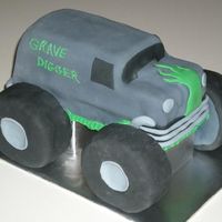 Grave Digger Birthday Cake I had a ton of fun making this one, I actually got this customer from a referral from the Dr.Seuss cake the week before. The tires are made...