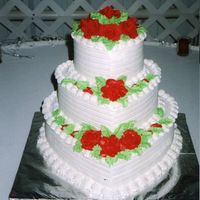 Hearts And Flowers This heart shaped cake was one of the simplest, only because the sides didn't have to be perfect after they were iced because they...