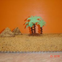 Desert Oasis Chocolate cake, dressed in finely ground cookies (sand) with chocolate pams.