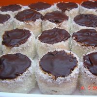 'russian Fur-Caps' Very decorative cake often made for weddings and other celebrations. Chocolate cake with vanilla filling.