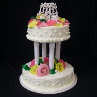 Cia Cake This was my cake for my test in my wedding cake class.....It had to be buttercream, 2 tier (stacked or tiered) and aprox. 2" each tier...