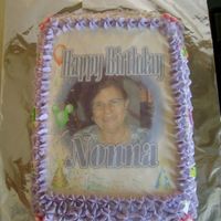 Nonna's Cake This was for my Mother in Laws 70th birthday! She cut all around the picture! Our pieces where sooooo small! She saved the whole picture...