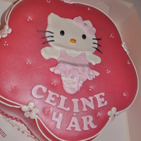 Hello Kitty Birthday Cake. marzipan covered cake.