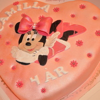 Minnie Mouse Cake. marzipancovered chocolatecake, minnie is made of marzipan as well.
