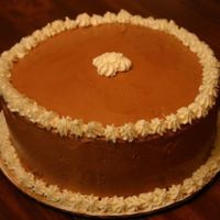 Banana Caramel Cake With Chocolate Buttercream Fluffy banana cake with caramel layers and chocolate buttercream. The stars are whipped cream. I'm not in cake decorating classes, but...