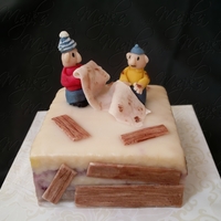 Pat A Mat Small cake with figures from Czech cartoon Pat a Mat. It is a punch cake - it has no other filling that the middle layer soaked in punch....