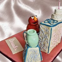 Elmo's World Cake 1st birthday cake for my younger niece - sponge cake with white chocolate buttercream, covered in sugarpaste. All cake covered in...