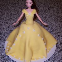 Belle Princess Cake I made this for my daughter's 4th birthday using the Pampered Chef 2 qt. batter bowl for the skirt. Dress is fondant.