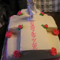 Maria's First Communion This cake is a 1/4 sheet cut in to a cross placed on another 1/4 sheet. All BC.