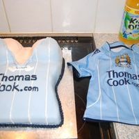 30Th Birthday Cake Not so rude as nothing on show but this is a cake for my brothers 30th as his passion is Manchester City football club, and his g/f boobs...