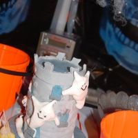 Castle Copied from Debbie browns Book, very rushed & it went wonkey, my first cake where I stacked it up (dodnt go so well lol) all...