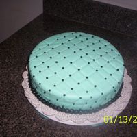 Quilted Cake MMF with black icing. This is my first attempt at this "quilted" design. My measurements could use some work, but overall, it...