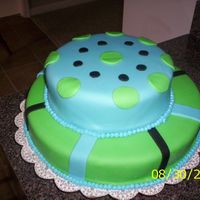 New_Cakes_013.jpg Fondant cake with fondant decorations. My first cake that I am selling. has a few imperfections that I'm not satisfied with, but...