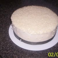 Sugar Pearls This is a sample cake for a bride getting married in December. It is vanilla/chocolate with buttercream icing and topped with a ridiculous...