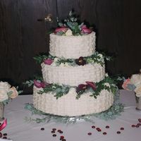 Basketweave Buttercream Buttercream frosting with fresh flowers on a triple chocolate cake.