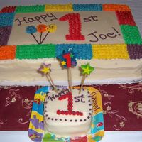 Son's First Birthday Double layer half-sheet cake Vienna Torte (family recipe) with a smaller cake for my son. All buttercream frosting. Inspired by the design...