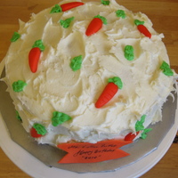 Carrot Cake Carrot Cake with cheese cream icing. Baby carrots made out of fondant!!!