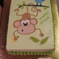 Monkey Around White sour cream pudding cake with bavarian cream filling, b/c frosting, fondant decorations. I matched it to a baby blanket for a jungle-...