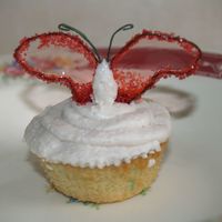 Butterfly Cupcake Vanilla cupacke with Cinnamon-honey buttercream frosting, adorned with gelatin butterfly wings.