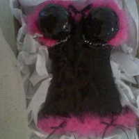Black & Hot Pink Cake For A Bridal Lingerie Shower This was a strawberry cake w/ chocolate butter cream covered in black chocolate ganache. The trim is actual hot pink boa. I delivered it in...