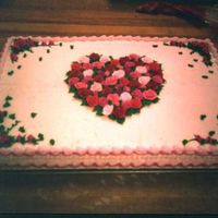 Heart Sheet Cake sheet cake with roses of different colors.
